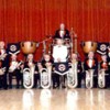 The band in 2000, taken before a recording session with Shrewton Band. Conductor : Ken Palmer.
Back Row: John Baker. Bob Travis. Peter Hollingdale-Smith. Helen Palmer. John Appleford. Glenys Hollingdale-Smith
Front Row: Sandra King. Ray Brotherton. Bill Prater. Brian Carter. Don Palmer. David Shutler. Phil Marston. Jean Jackson. Hillary Dearden. Ruth Tuck.