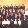 Spring 2006 - Antrobus House Concert. MD - Colin Gray ATCL.

Back Row: Phil Marston, Brian Watts, Peter Hollingdale-Smith, Dave Coombs guest player, Max Carter, Brian Carter, Matt Spencer.
Middle Row: Dani Coal, Andrew Carter, Glenys Hollingdale-Smith, Richard King, Dennis Burgess, Peter Cowdrey, Sandra King, Mike Dunford, Glyn Titley, Susie Cameron, Elliott Hope, Phil Hope. Dian Bartlett.
Front Row: George Cole, John Vent, Colin Gray, Jean Jackson, Ray 
Brotherton, Helen Palmer.
Front: some members of our learner section