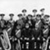 Back Row: George Thomas. ?. W Maggs.V Hunt. L Hunt. C Hunt. P Stone.. E Harrison(Snr).
Centre Row: Fred Cooper. ?. Eggy Palmer. ?. Don Harrison. Con Thomas. ?. ?. Reg Thorne. Croppy
Kilford.
Front Row: Harold Ware. Percy Dunford. Scooty Hunt. Mr Hinksman(Band President). Ted Harrison.

